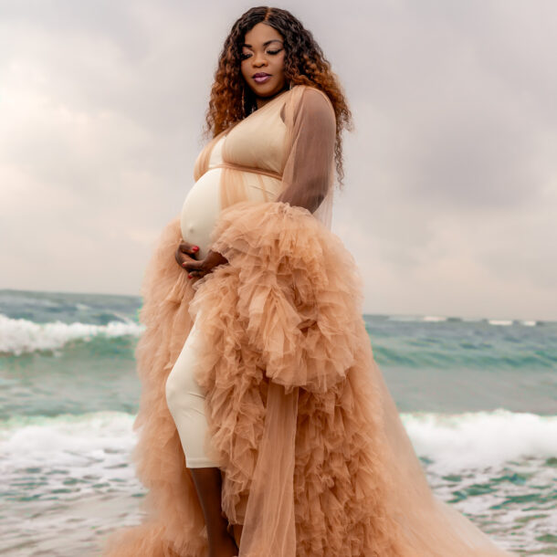 Maternity session with a beach setting.