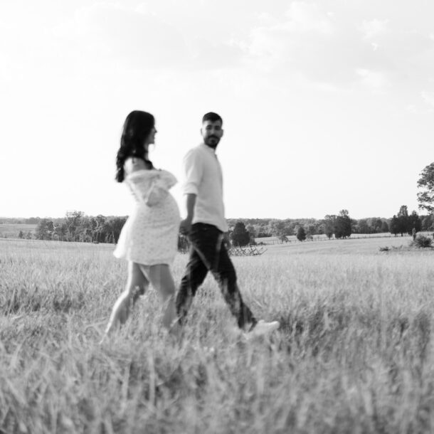 Maternity photography session at Manassas Battlefield Park during sunset.