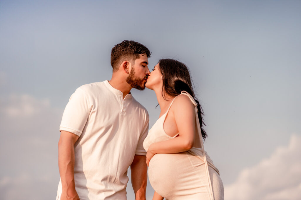 Maternity photography session at Manassas Battlefield Park during sunset.