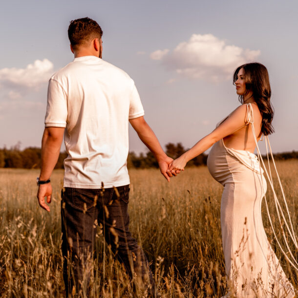 Maternity photography session at Manassas Battlefield Park during sunset.