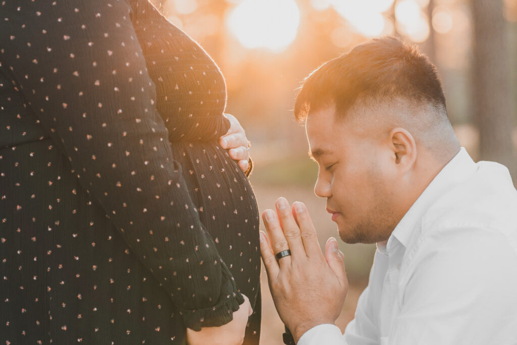 Sunset maternity photoshoot at Stumpy Lake, Virginia Beach.